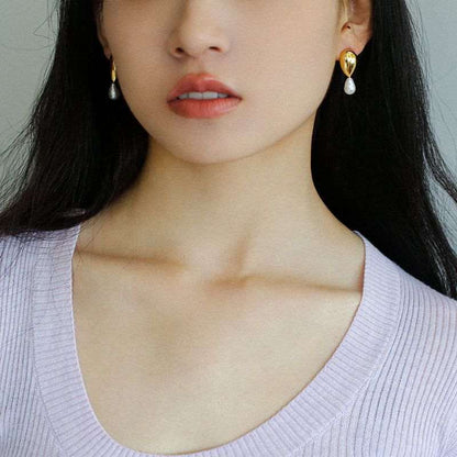 Effortlessly Stylish: Asymmetrical Metal and Pearl Earrings earrings from SHOPQAQ