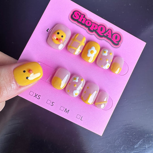 Here's an SEO-optimized English description for your product:  "Little Yellow Duck" Handcrafted Press-On Nails - Cute & Bright, Summer 2024 New Arrival, Hand-Painted Student-Friendly Nail Art | False Nails | False Nails, Handmade False Nails, press on nails | SHOPQAQ