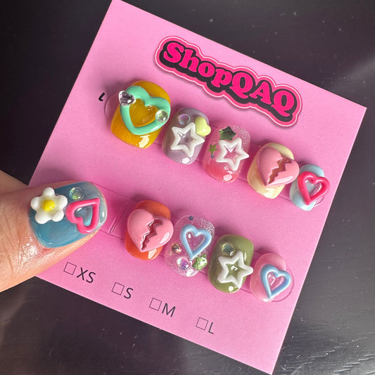 Here's an SEO-optimized English description for your product:  "IU-Inspired Thai Multicolor Handmade Press-On Nails - Cute 3D Design | False Nails | False Nails, Handmade False Nails, press on nails | SHOPQAQ