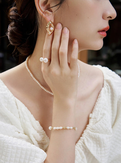 Asymmetrical Sterling Silver Pearl Earrings earrings from SHOPQAQ